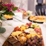 beautiful fruit and cheese on a board