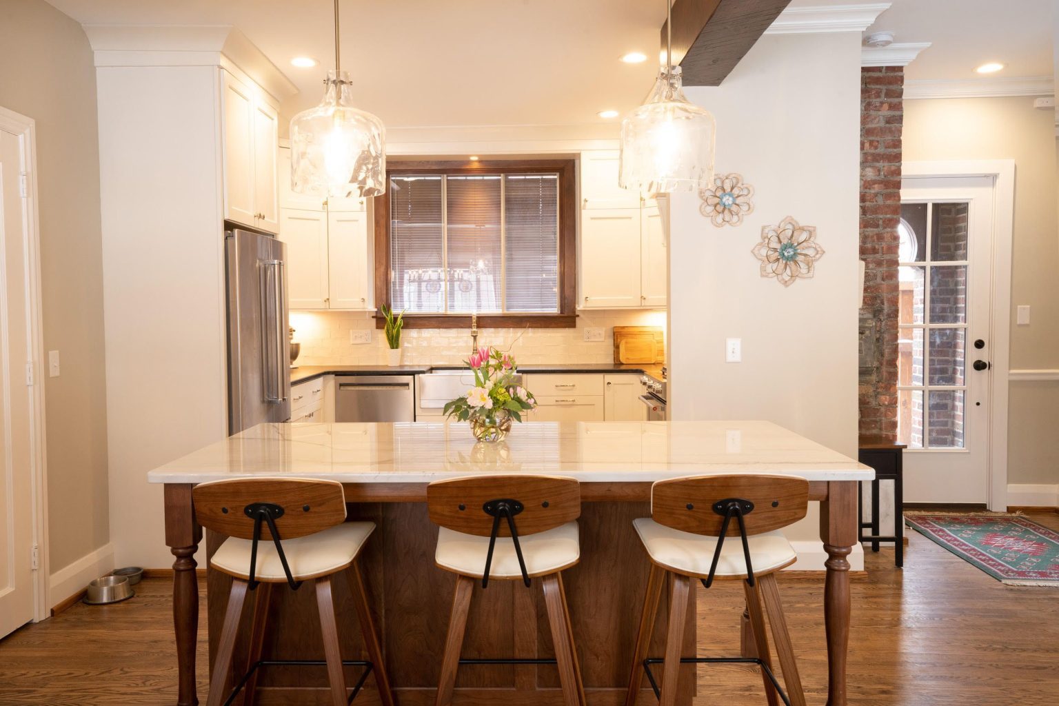 Large kitchen island and bar stools installed by Old Orchard kitchen remodeler