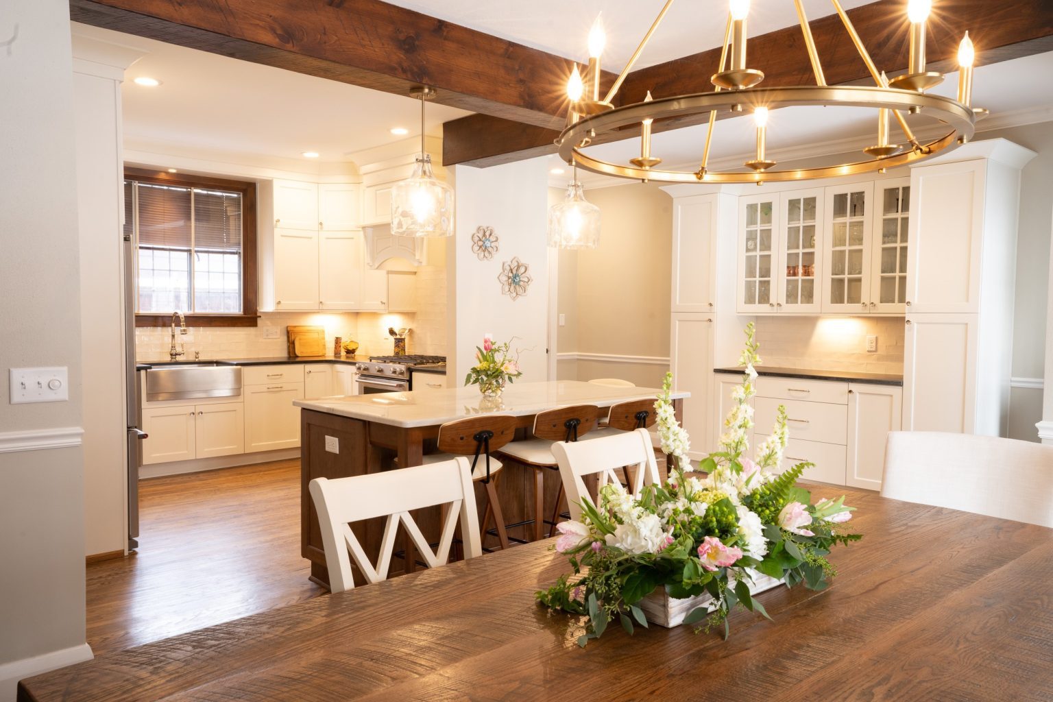 Modern kitchen and dining area with open concept installed by Old Orchard kitchen remodeler